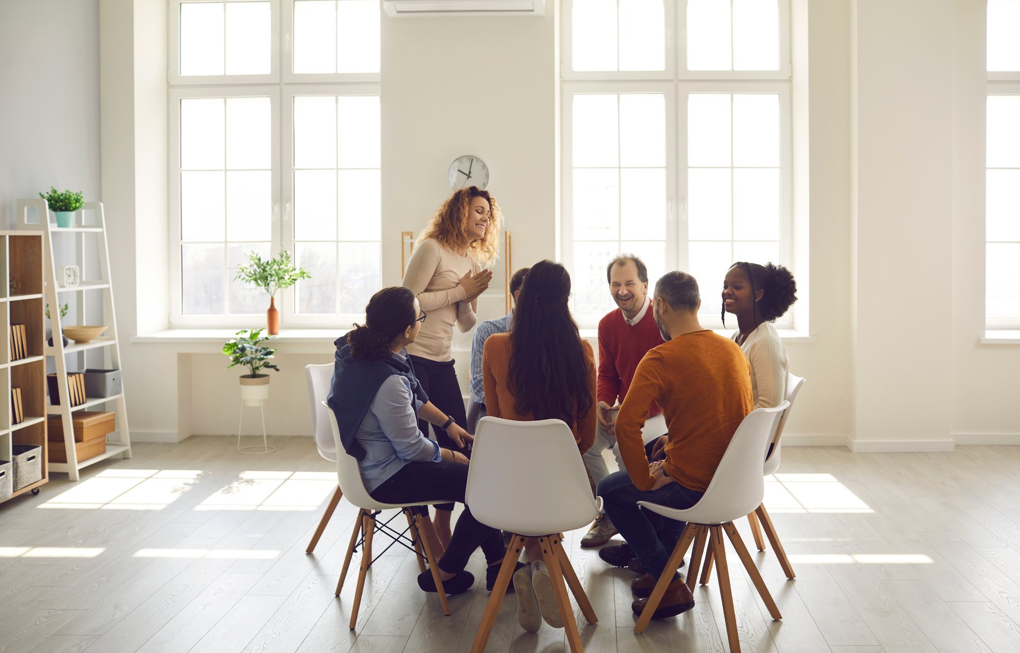 People Participating in Group Therapy for Social Skill Training in Bright Office